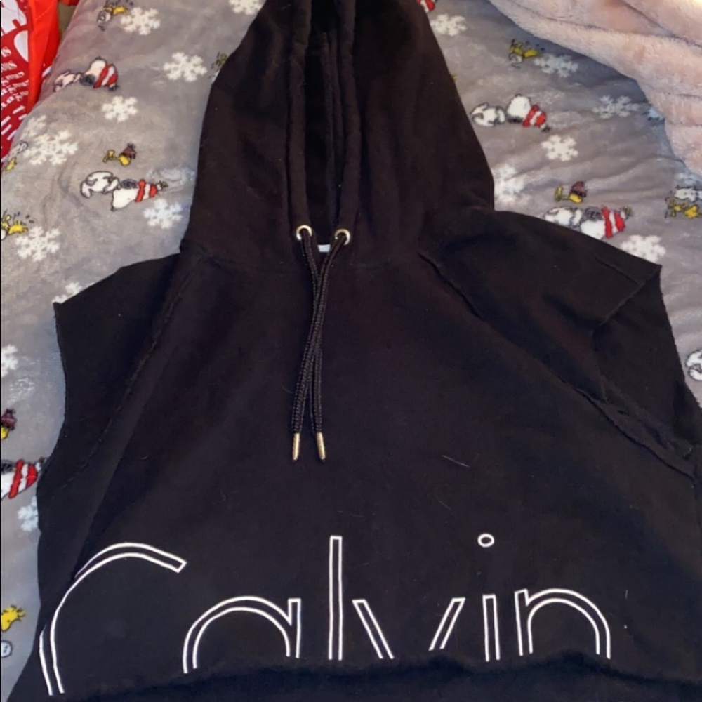 Calvin Klein sleeveless sweatshirt.
